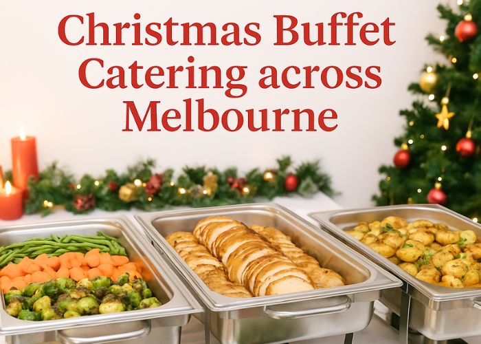 Christmas buffet catering event in Melbourne city venue with guests serving themselves from a festive spread featuring roast turkey, vegetables, salads, and platters. Warm lighting, Christmas tree, and red candles create a joyful atmosphere